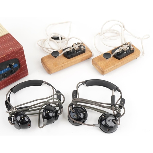 1334 - Two military interest Morse code tappers with headsets