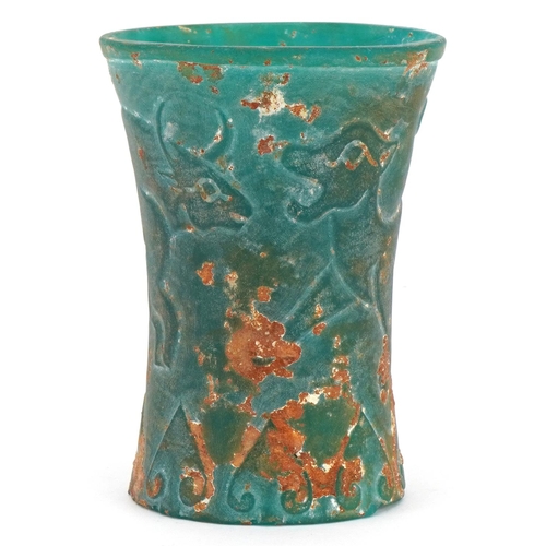 1799 - Chinese archaic style turquoise glass beaker decorated with mythical animals, 10.5cm high