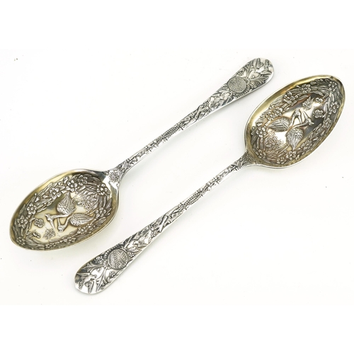 1740 - Pair of Victorian aesthetic silver plated tablespoons embossed with birds, butterflies, flowers and ... 