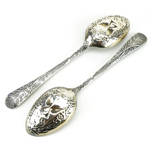 1740 - Pair of Victorian aesthetic silver plated tablespoons embossed with birds, butterflies, flowers and ... 