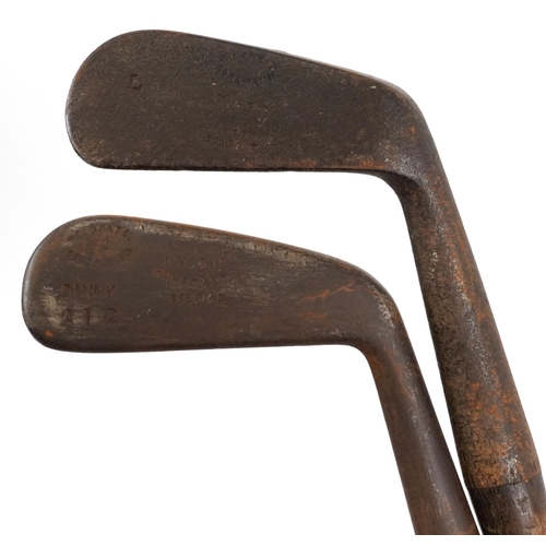 1290 - Predominantly vintage wooden shafted golf clubs housed in a vintage caddy including Cargills Ltd, Jo... 