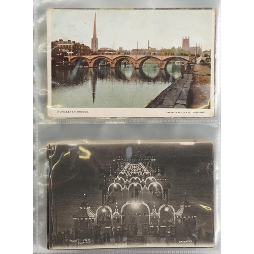 940 - Early 20th century and later postcards arranged in an album including Brighton Palace Pier and Stock... 