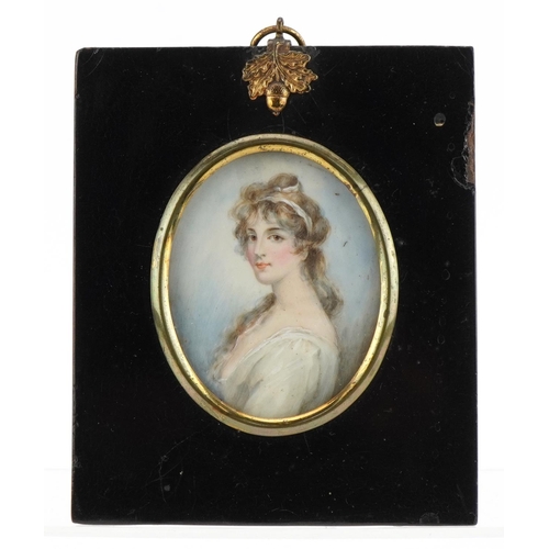 290 - 19th century oval hand painted portrait miniature of a young female housed in an ebonised frame, The... 