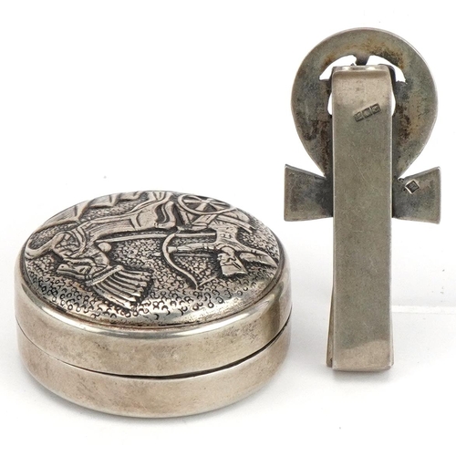 1757 - Egyptian silver Relic tie clip and circular silver pillbox, the largest 4.5cm in length, total 39.8g