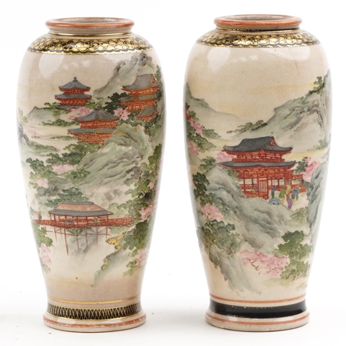 509 - Pair of Japanese Satsuma pottery vases finely decorated with landscapes, character mark to the base,... 