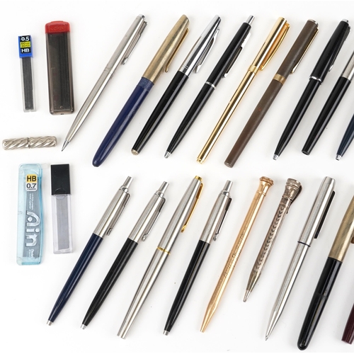 529 - 19th century and later fountain pens, ballpoint pens and pencils, some with gold nibs, including Par... 