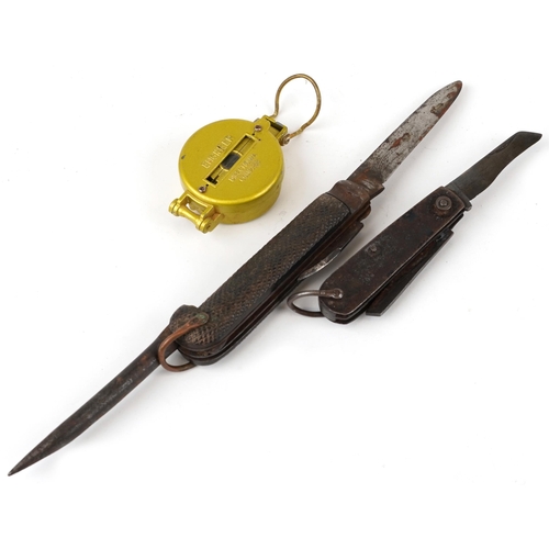 1382 - Two antique folding pocket knives and an engineer's directional compass