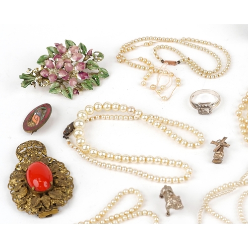 2550 - Vintage and later costume jewellery, some silver, and military badges including pearl necklace with ... 