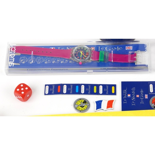 2552 - Swatch, two commemorative presentation wristwatches with boxes and paperwork, limited edition of 310... 