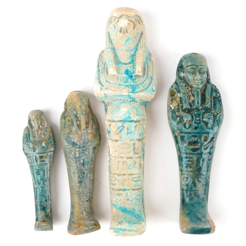 1469 - Four Egyptian style faience glazed ushabtis, the largest 19cm high