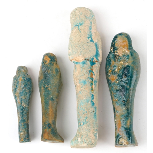 1469 - Four Egyptian style faience glazed ushabtis, the largest 19cm high