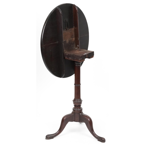 1069 - Georgian circular mahogany tilt top occasional table, 73cm high x 61cm in diameter