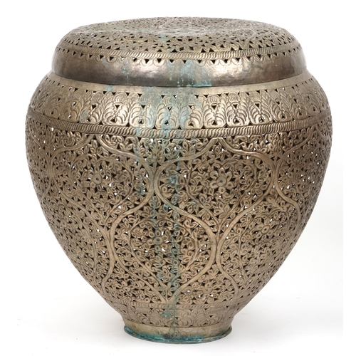 1091 - Moroccan pierced metal basket and lid with stylised floral decoration, 60cm high x 56cm in diameter