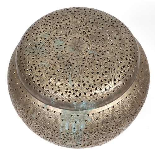 1091 - Moroccan pierced metal basket and lid with stylised floral decoration, 60cm high x 56cm in diameter