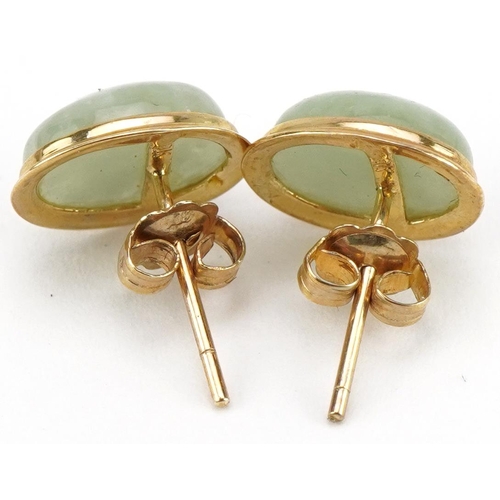 2126 - Pair of 9ct gold cabochon green jade stud earrings, 1cm high, 1.5g