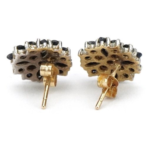 2080 - Pair of 9ct gold diamond and sapphire cluster stud earrings, 1.1cm in diameter, 2.4g