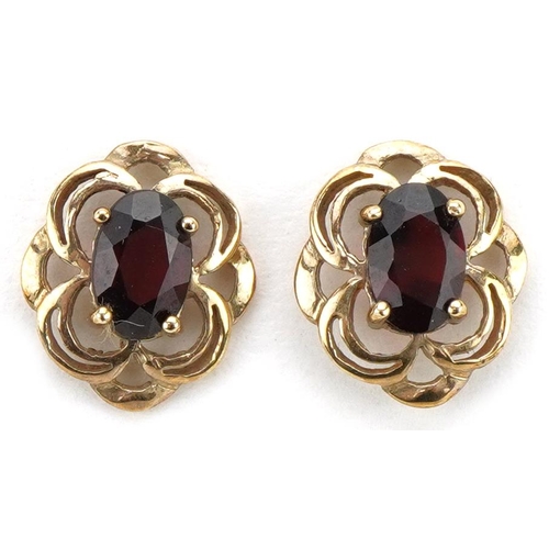 2089 - Pair of 9ct gold garnet openwork stud earrings, 1.1cm high, 1.1g