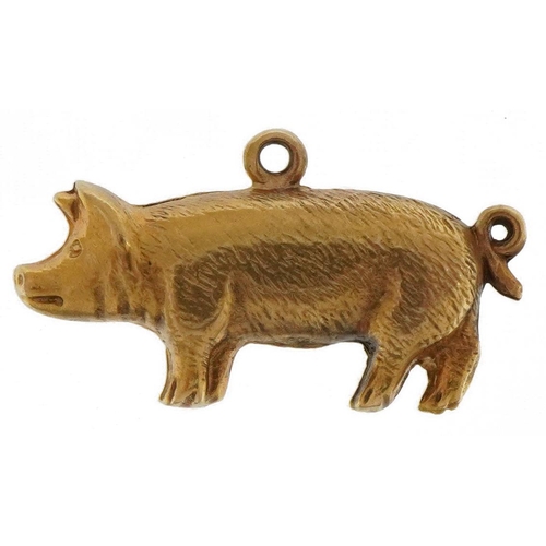 2129 - 9ct gold pig charm, 2cm in length, 0.7g