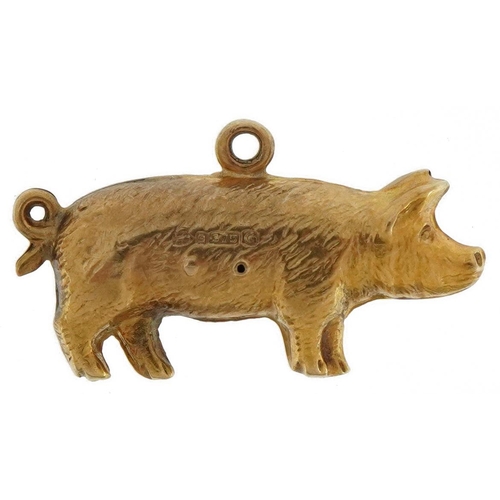 2129 - 9ct gold pig charm, 2cm in length, 0.7g