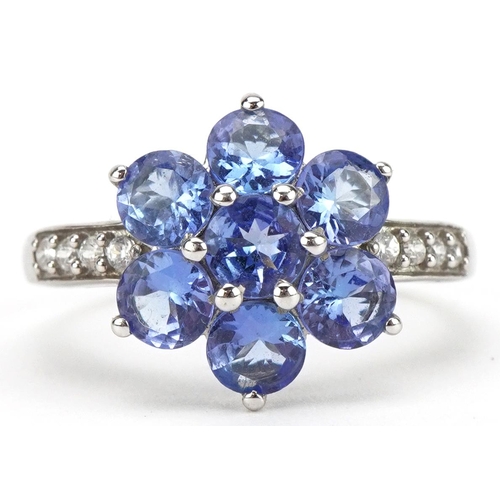 2137 - 9ct white gold tanzanite flower head ring with diamond set shoulders, size P, 3.3g