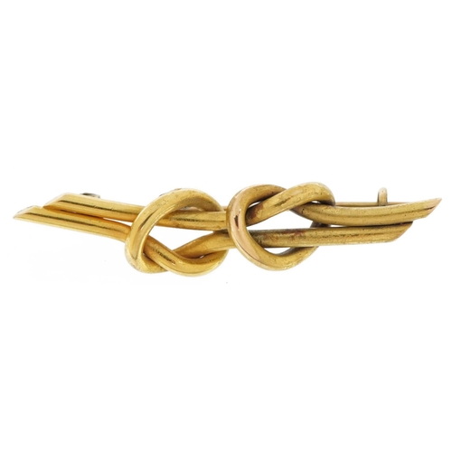 2088 - Unmarked gold knot design bar brooch, tests as 9ct gold, 4.5cm wide, 4.2g