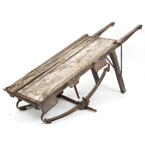 1115 - Large antique agricultural interest wooden cart with iron mounts, 176cm in length