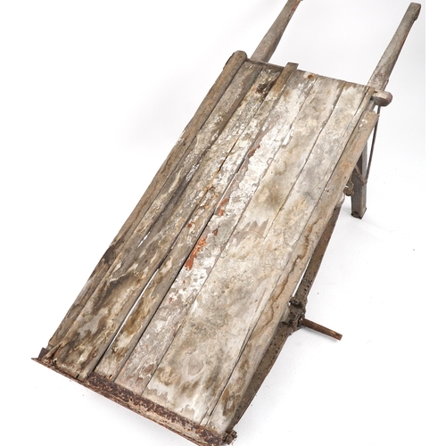 1115 - Large antique agricultural interest wooden cart with iron mounts, 176cm in length