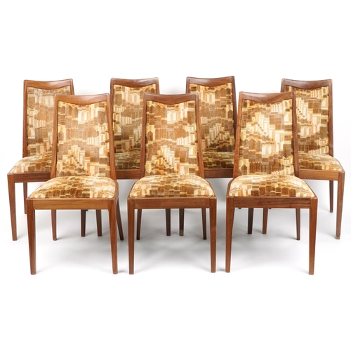 1129 - Seven mid century G Plan teak dining chairs with geometric upholstered back and seats, each 92cm hig... 