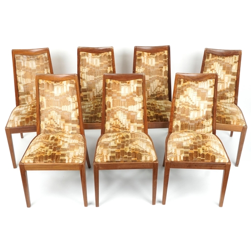 1129 - Seven mid century G Plan teak dining chairs with geometric upholstered back and seats, each 92cm hig... 