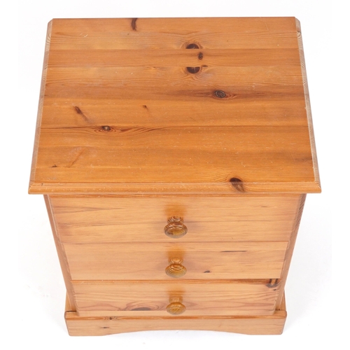 1143 - Pine three drawer night stand, 59.5cm H x 46.5cm W x 38cm D