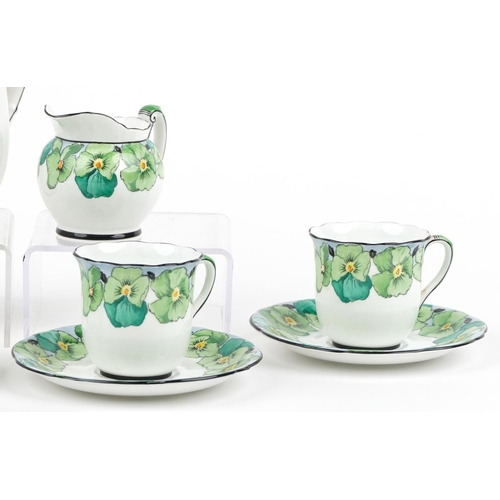 1644 - Foley china teaware hand painted with flowers comprising coffee pot, four cups with saucers and crea... 