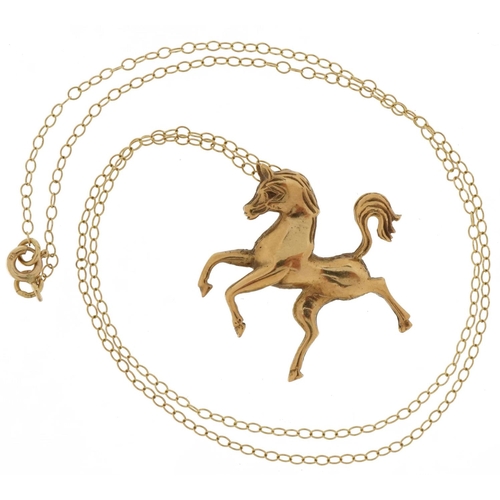 2106 - 9ct gold rearing horse pendant on 9ct gold necklace, 3cm high and 42cm in length, 4.7g