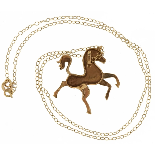 2106 - 9ct gold rearing horse pendant on 9ct gold necklace, 3cm high and 42cm in length, 4.7g