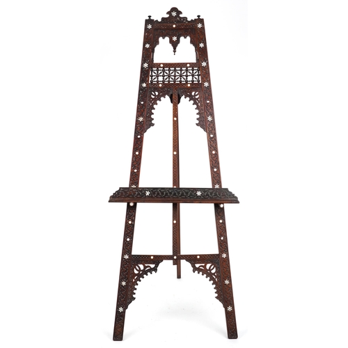 1084 - Attributed to Liberty & Co, Moorish hardwood floor standing easel with mother of pearl inlay profuse... 