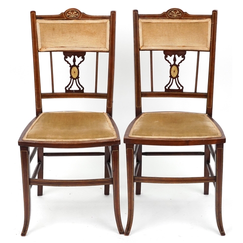 1153 - Four Edwardian inlaid mahogany salon chairs including two carvers, the largest each 90cm high