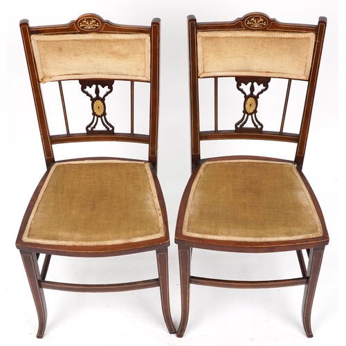 1153 - Four Edwardian inlaid mahogany salon chairs including two carvers, the largest each 90cm high