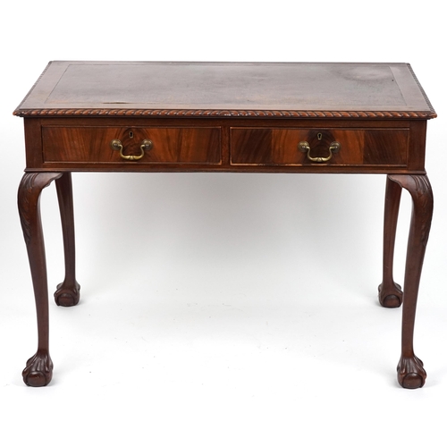 1067 - Edwardian mahogany writing table with two frieze drawers on ball and claw feet, 77cm H x 107cm W x 6... 