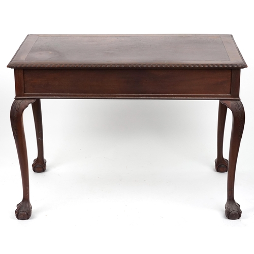 1067 - Edwardian mahogany writing table with two frieze drawers on ball and claw feet, 77cm H x 107cm W x 6... 