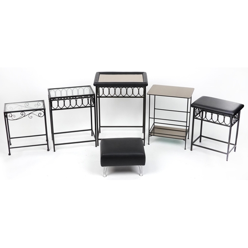 1061 - Five contemporary wrought iron and glass occasional tables and a footstool with chrome legs, the lar... 