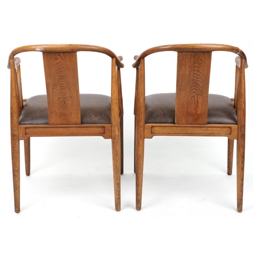 1135 - Pair of Scandinavian hardwood dining chairs with brown leather backs and seats, 78cm high