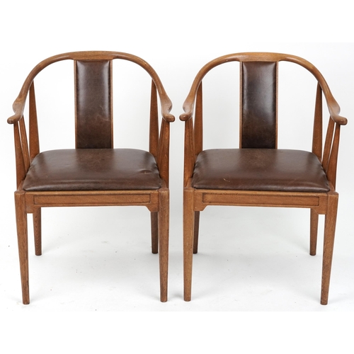 1134 - Pair of Scandinavian hardwood dining chairs with brown leather backs and seats, 78cm high