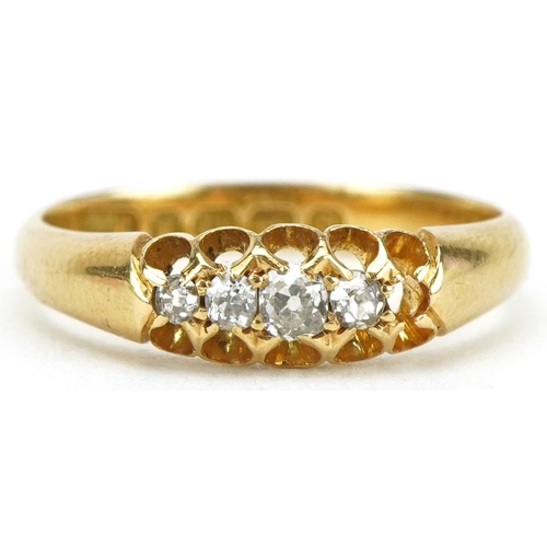 2061 - 18ct gold graduated diamond ring with pierced setting, the central diamond approximately 2.70mm in d... 