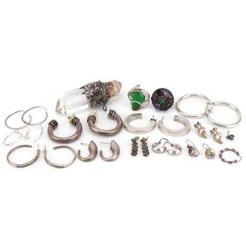 2597 - Silver jewellery including pairs of hoop earrings, some Mexican, multi gem ring and a large rock cry... 