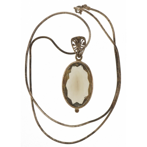 2576 - Large silver smoky quartz pendant on a silver necklace, 5cm high and 50cm in length, 20.2g