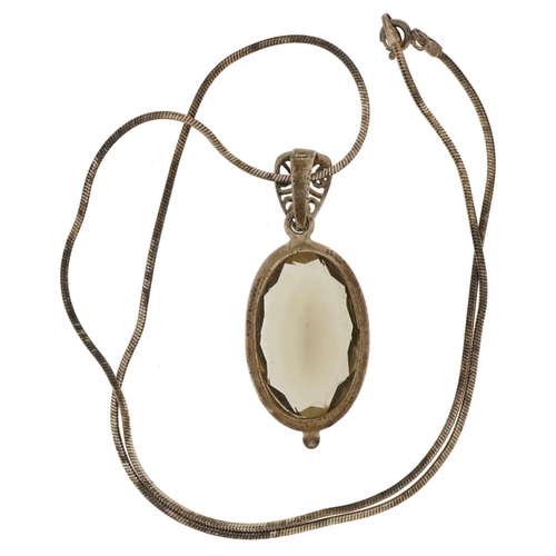 2576 - Large silver smoky quartz pendant on a silver necklace, 5cm high and 50cm in length, 20.2g