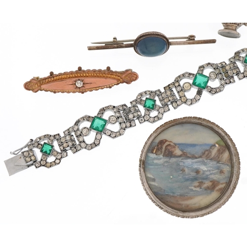 2594 - Antique and later jewellery including a circular brooch hand painted with a coastal scene, Art Deco ... 