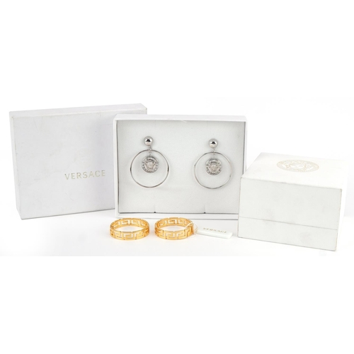 2607 - Two pairs of Versace designer earrings including a pair of Greek key design, housed in Versace boxes... 