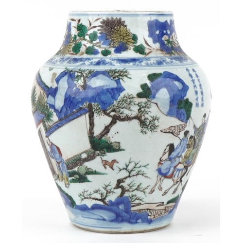 11 - Large Chinese wucai porcelain vase hand painted with a figure on horseback and attendants crossing a... 