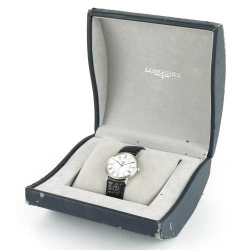 2563 - Longines, gentlemen's stainless steel wristwatch with date aperture with box and guarantee card, 32m... 