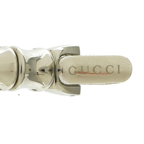 2605 - Gucci, ladies Gucci 6800L wristwatch with simulated bamboo strap and monogram dial, with box and pap... 